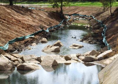 Barr St Park September 2007 Placing rocks in the creek