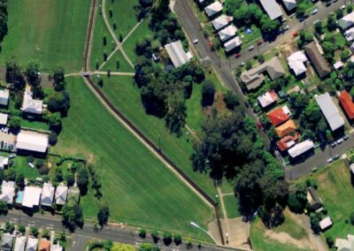 Previous concrete channel and mown grass